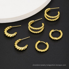 2021 new fashion personality design gold plated brass C-shaped twist earrings